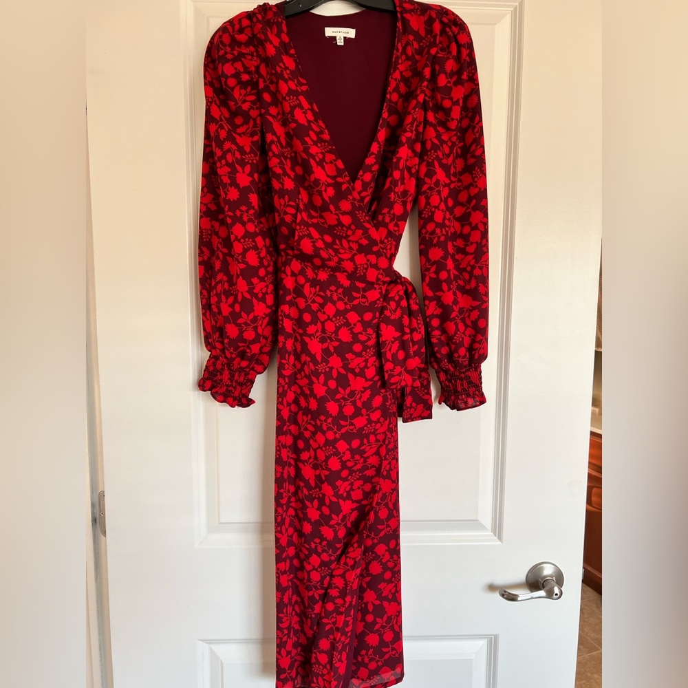 Burgundy wrap dress with red flowers.